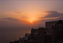 Watch the sunset from Oia